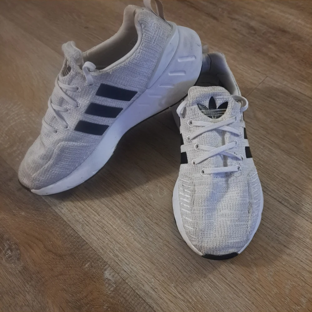 Adidas Kids' White Athletic Sneakers with Black Stripes